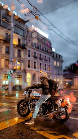 A person riding a motorcycle on a city street