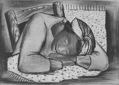 A person sleeps peacefully on a patterned surface.