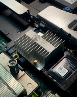A close up of a motherboard with a cpu chip