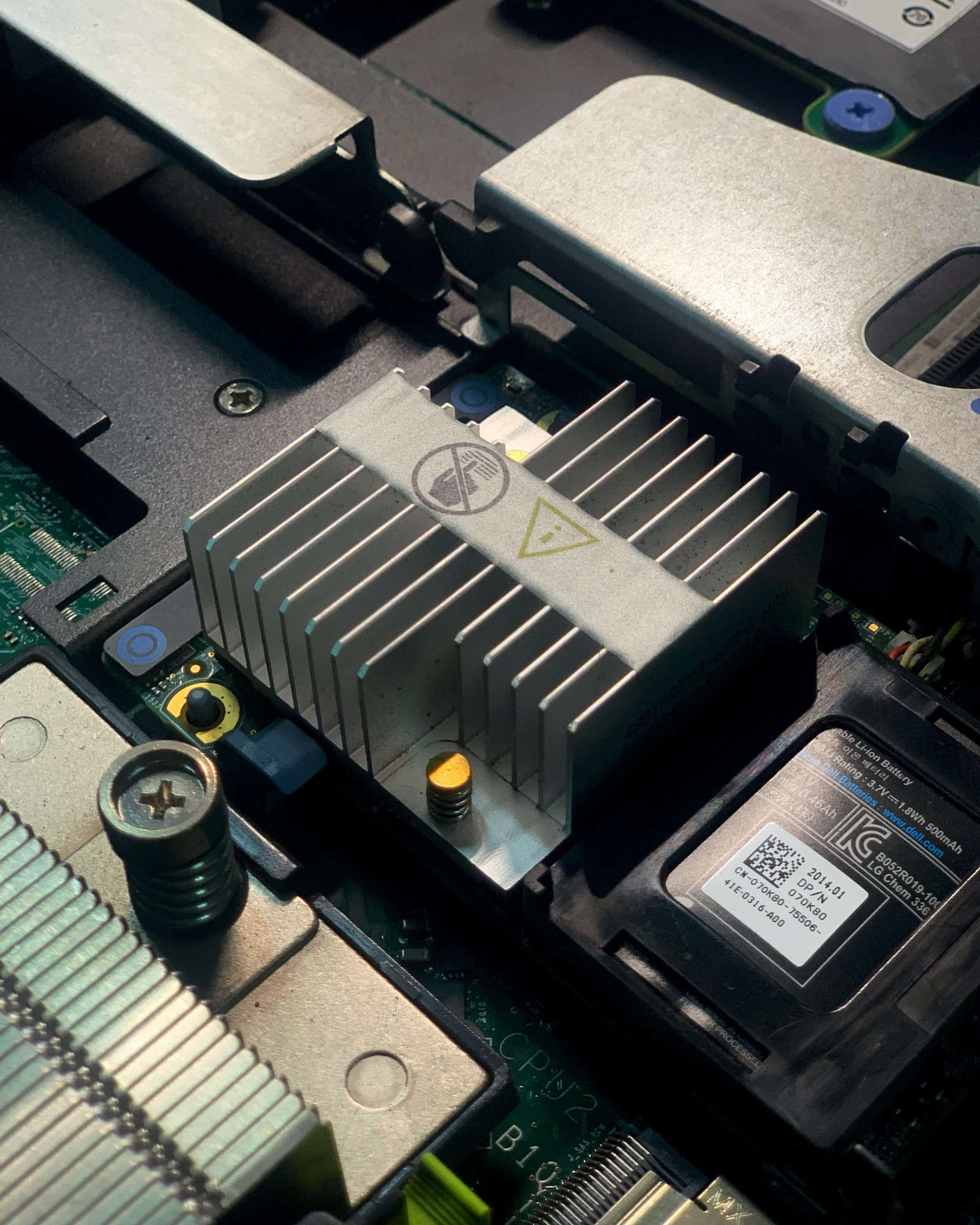 Macro photography of an advanced computer motherboard, silicon processor socket, and circuit architecture in dark lighting