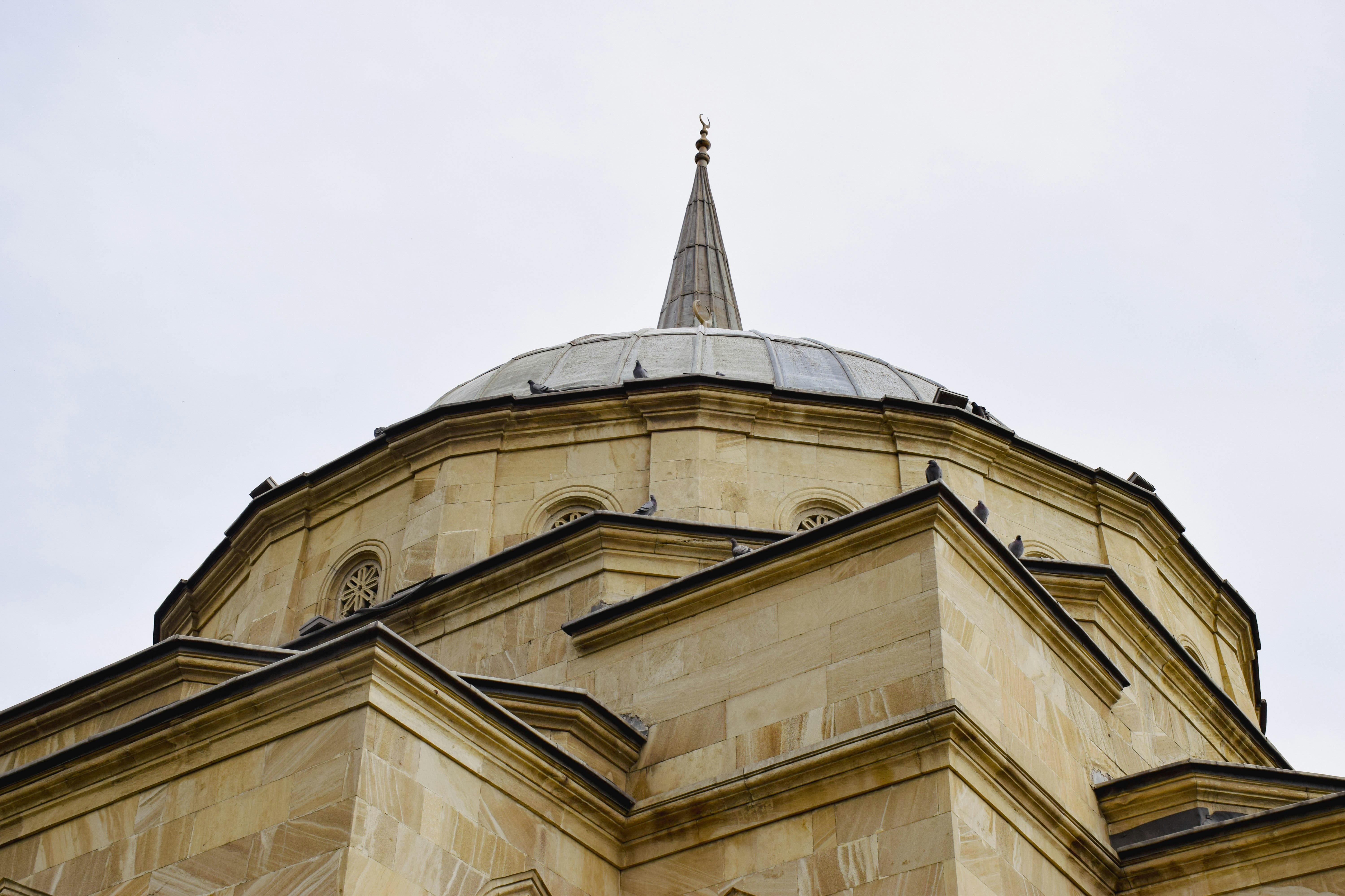 A tall building with a clock on the top of it