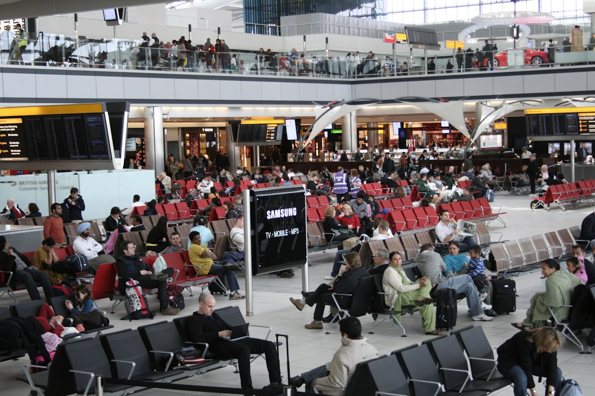 Travelers at airport terminal during record Memorial Day 2026 weekend