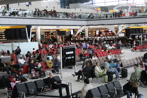 Travelers at airport terminal during record Memorial Day 2026 weekend