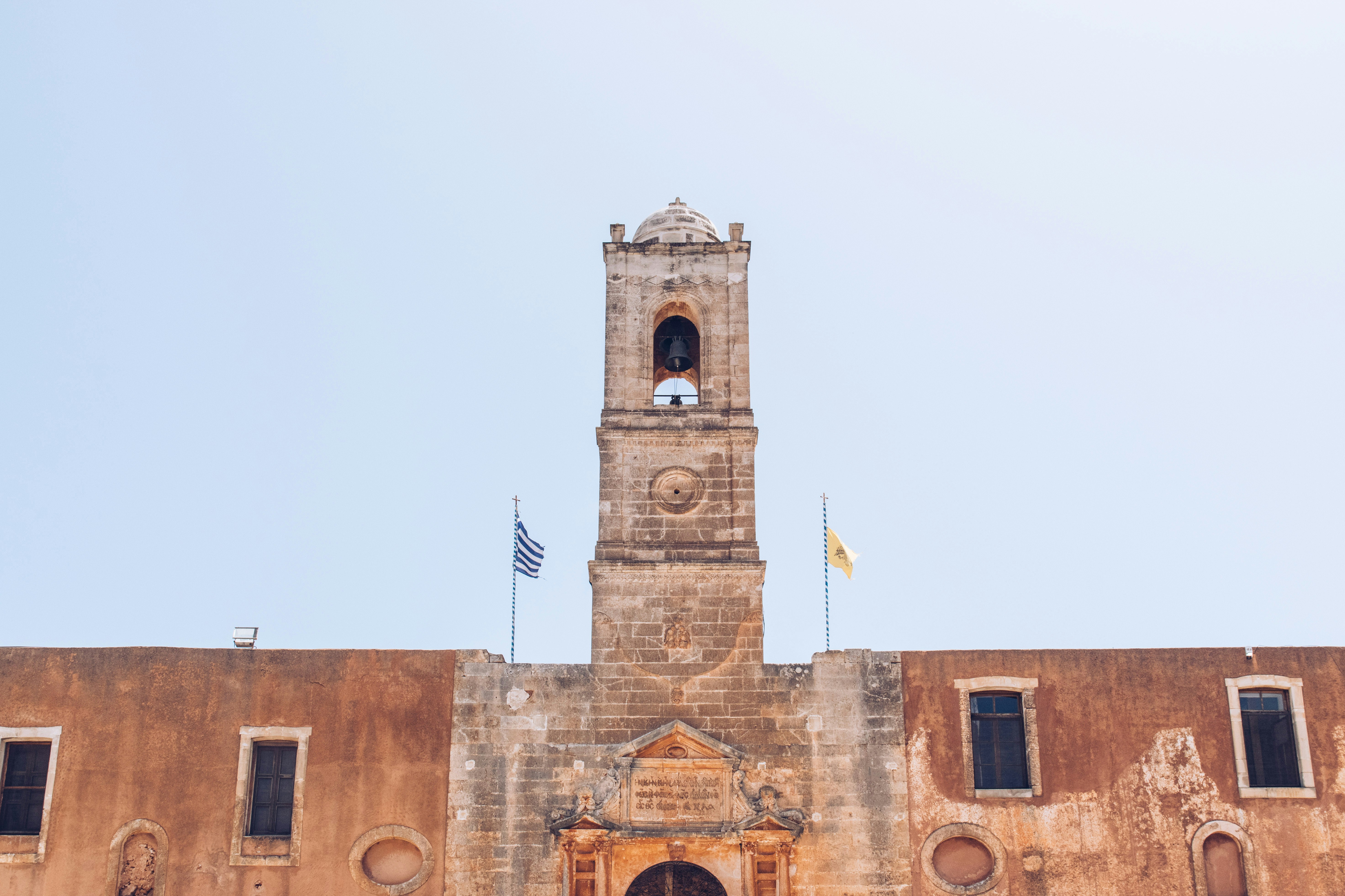 A tall building with a clock tower on top of it