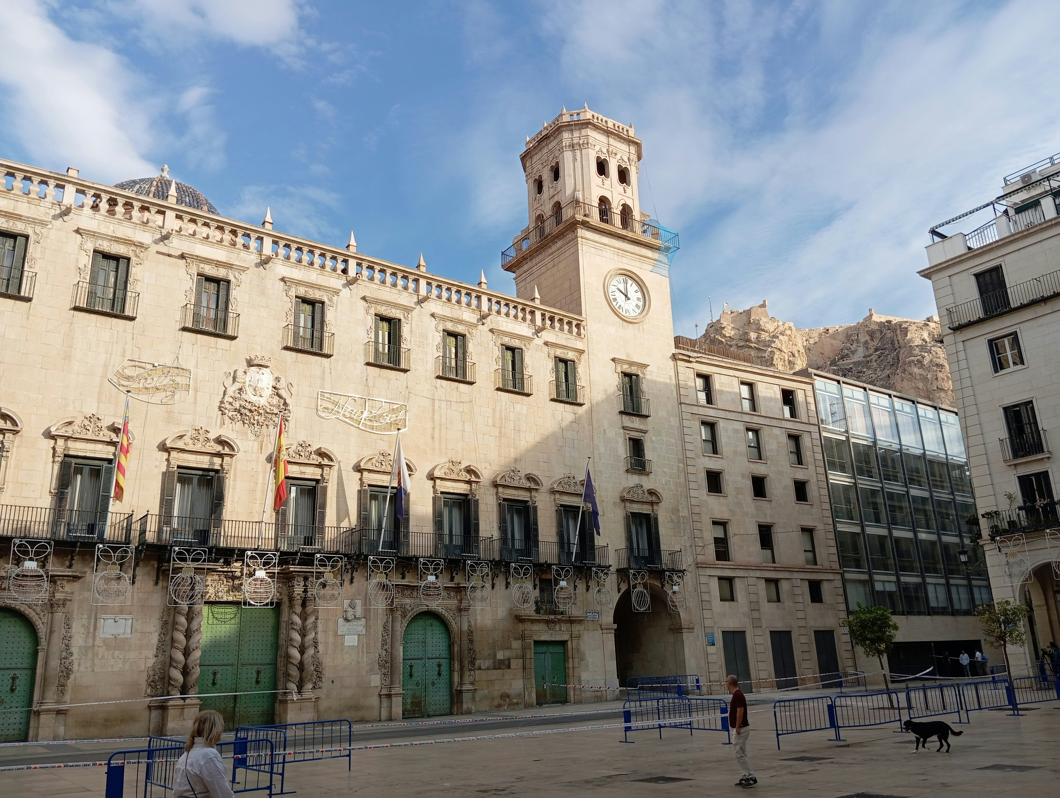 A large building with a clock on the top of it