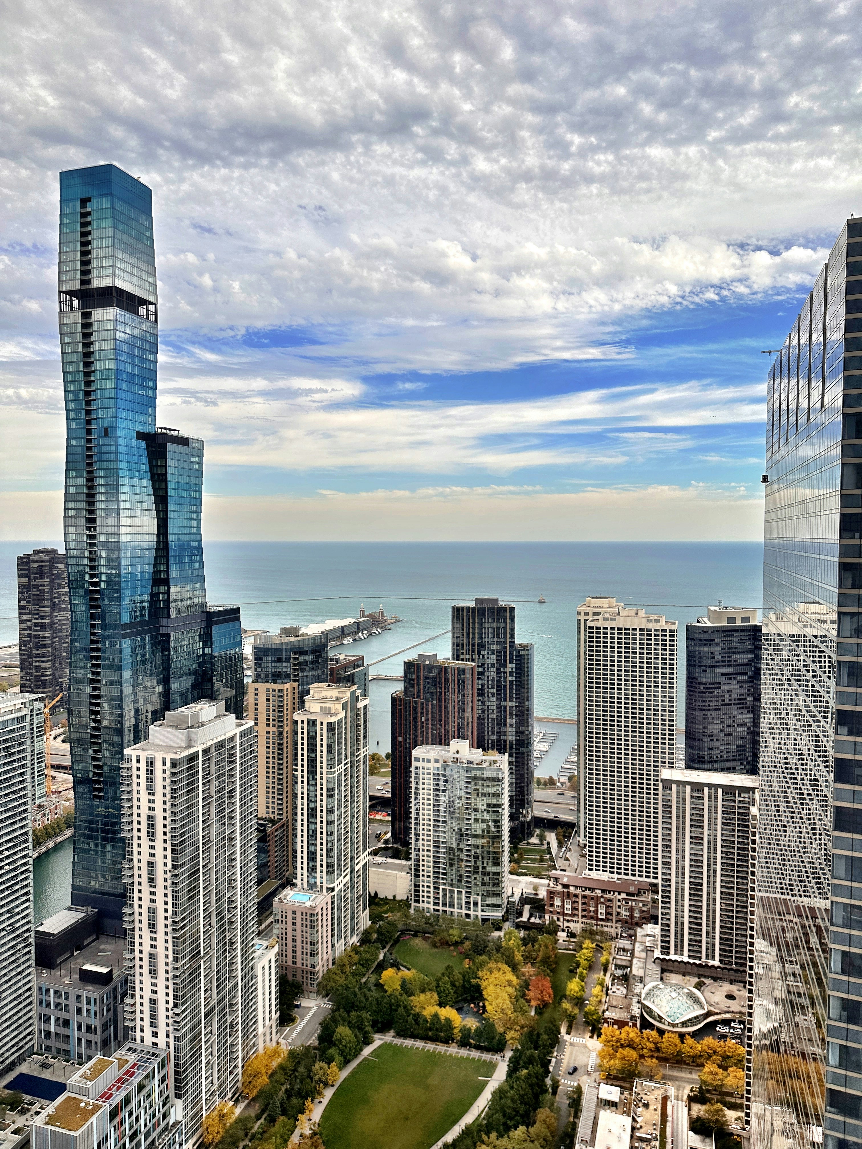 An aerial view of a city with tall buildings