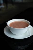 A cup of hot chocolate on a saucer