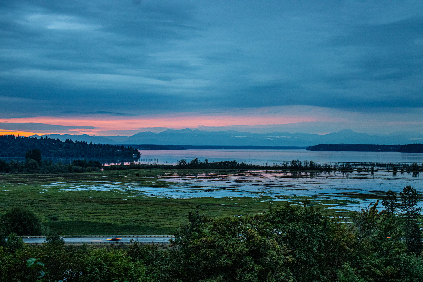 Sunset over the Snohomish River estuary and Puget Sound, the North Sound region served by our branch crews