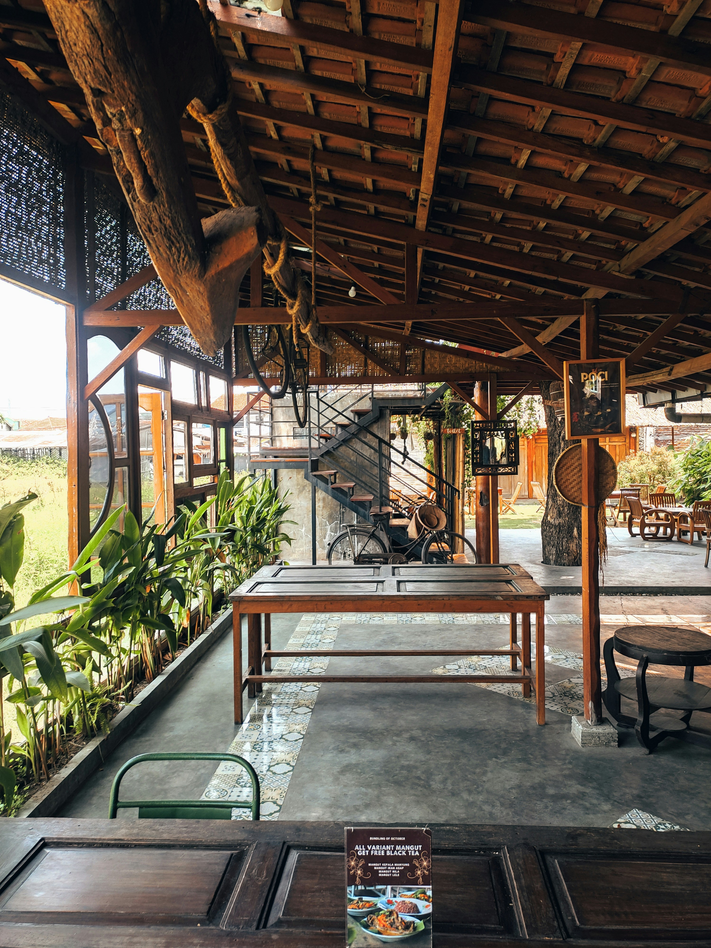 An outdoor dining area with tables and chairs