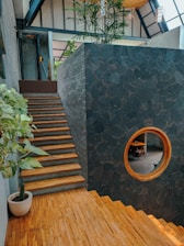 A room with a wooden floor and stairs