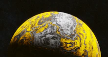 A yellow and black marble ball on a black background