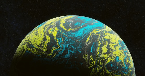 A close up of a blue and yellow ball on a black background