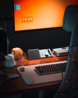 A desktop computer sitting on top of a wooden desk