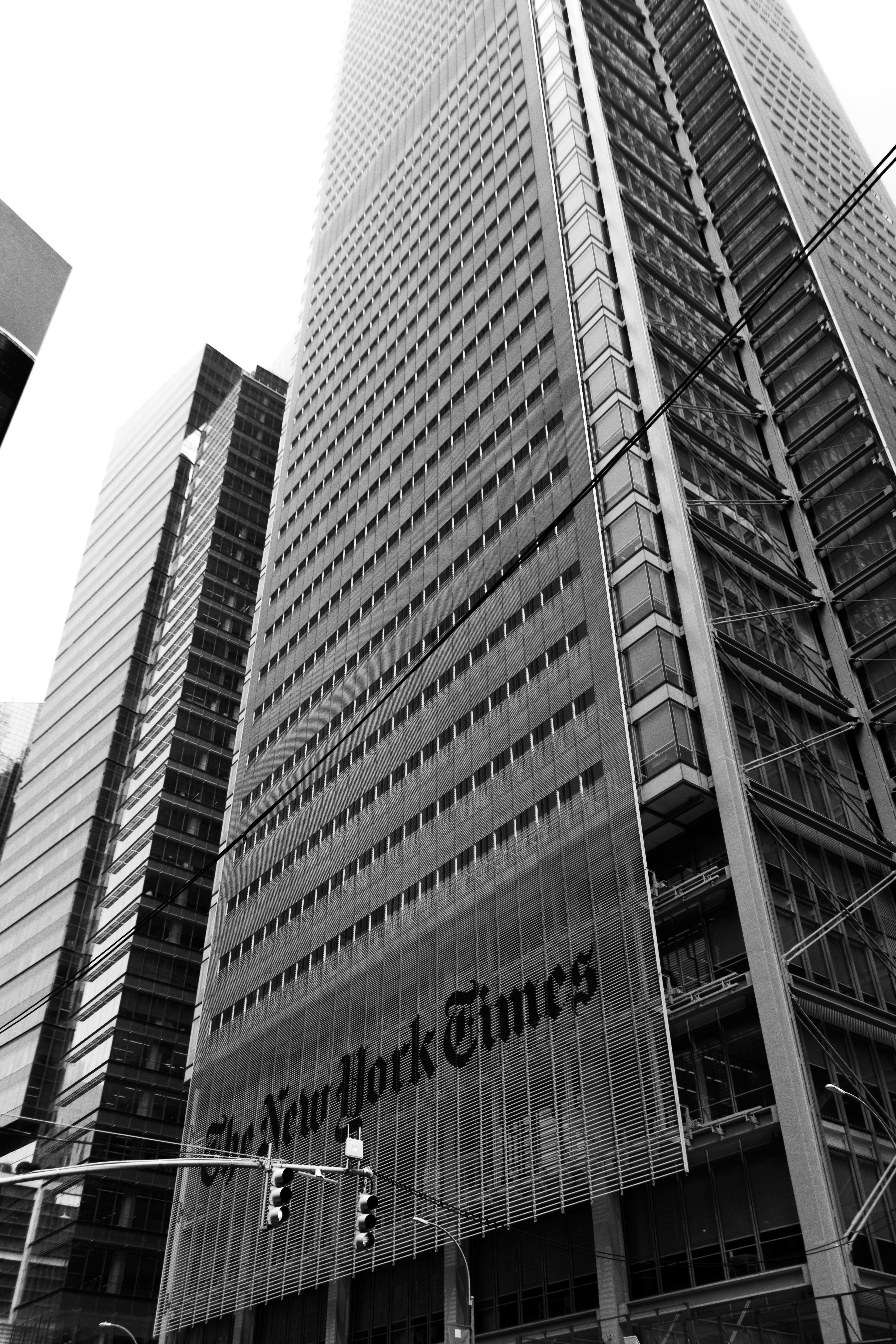A black and white photo of the new york times building