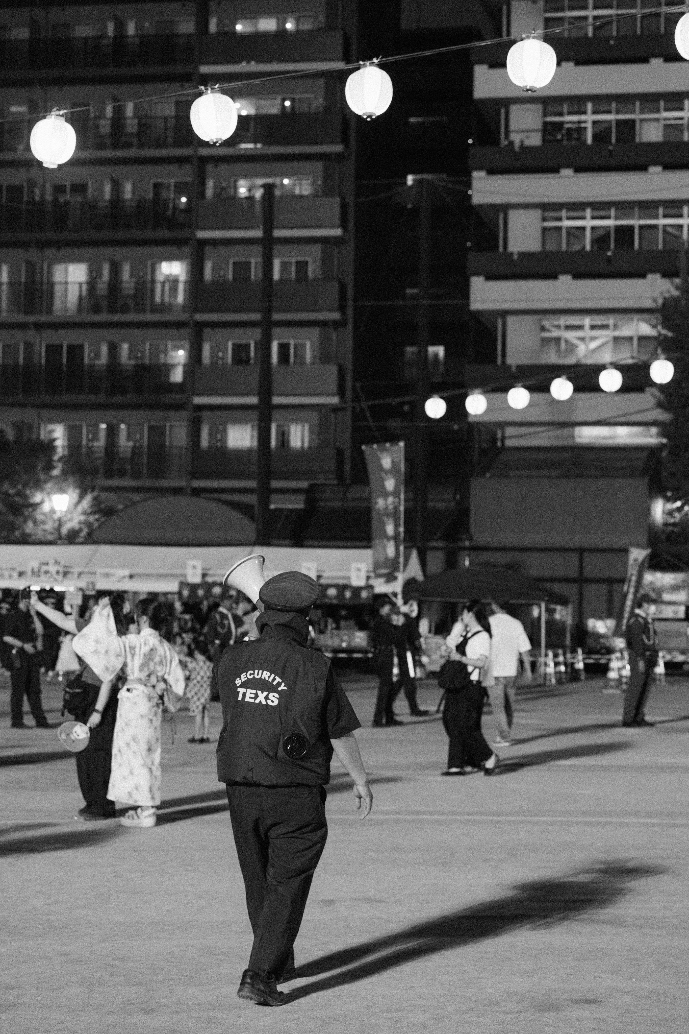 A black and white photo of people walking around photo – Free Japan ...