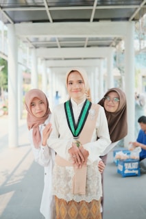 A group of women standing next to each other