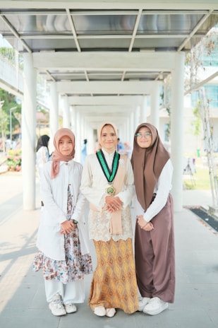 A group of women standing next to each other
