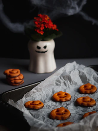 A pan filled with cookies sitting on top of a table