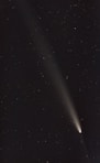 A comet is seen in the night sky
