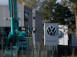 A volkswagen plant is shown in front of a building