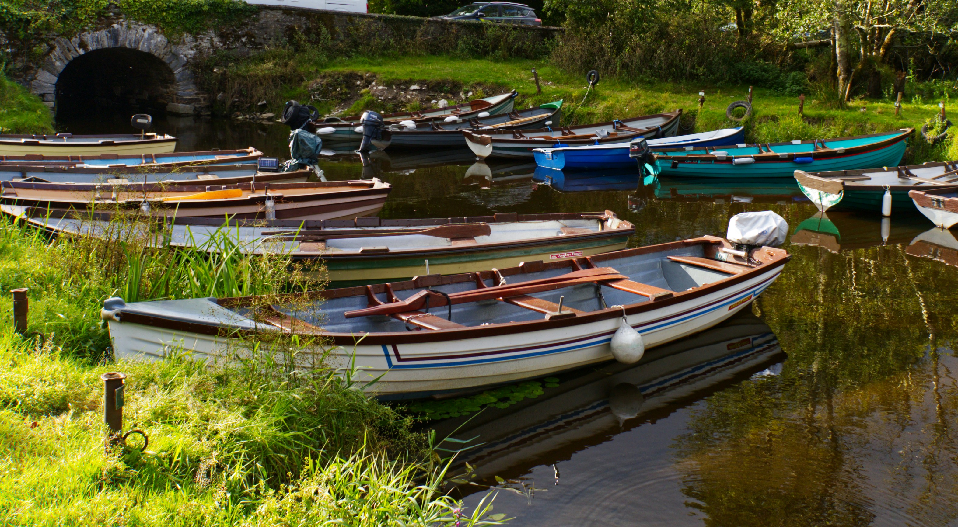 A bunch of boats that are sitting in the water