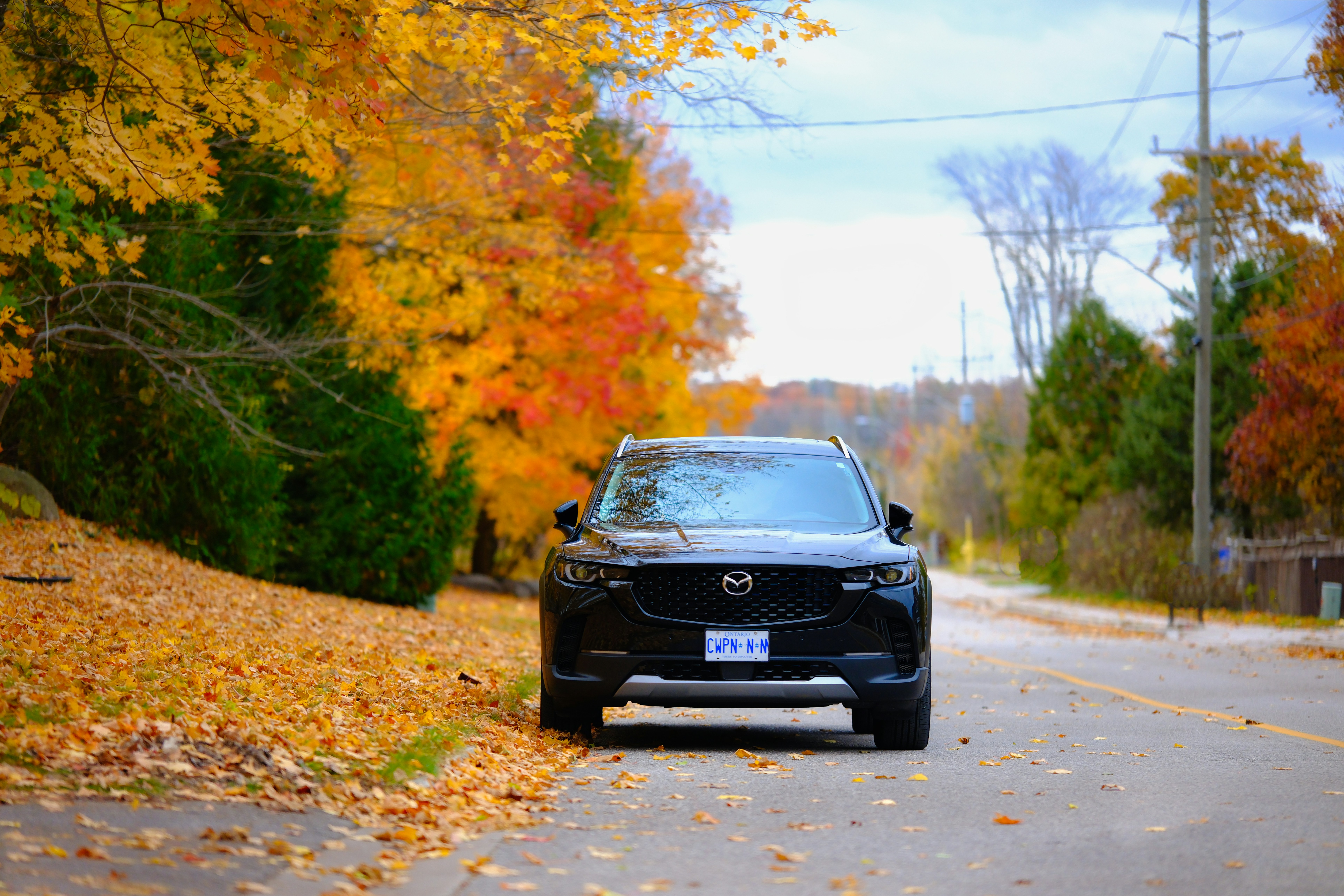 A car is parked on the side of the road