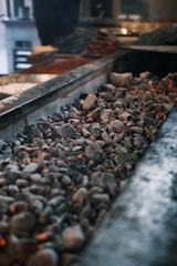 A close up of rocks and gravel near a building