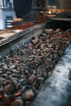 A close up of rocks and gravel near a building