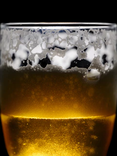 A close up of a glass of beer