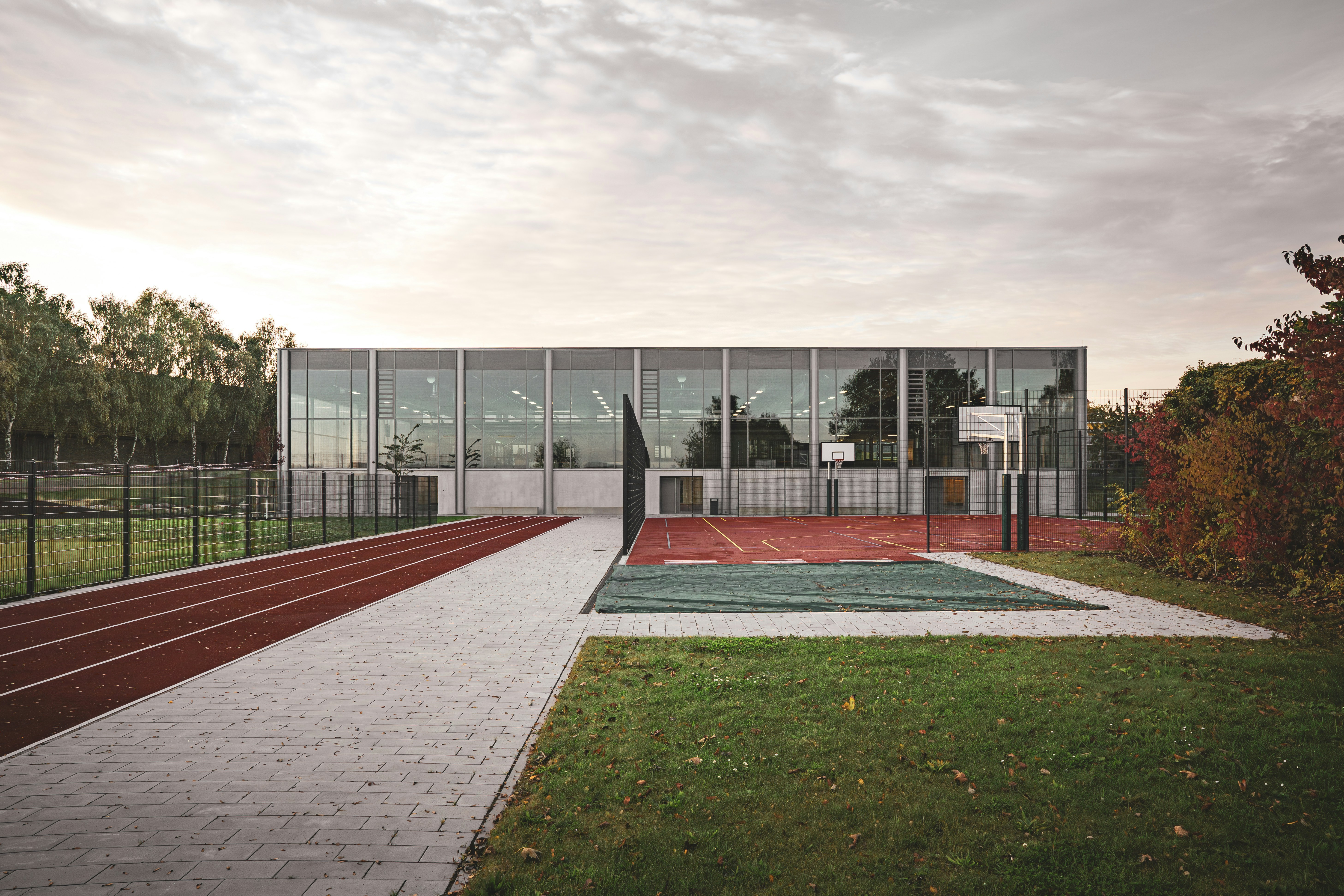 Elite Academy campus building in autumnal sunrise
