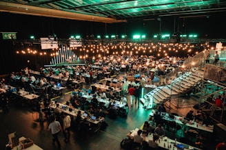 A large room filled with lots of tables and chairs
