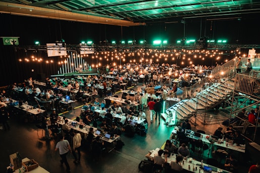 A large room filled with lots of tables and chairs