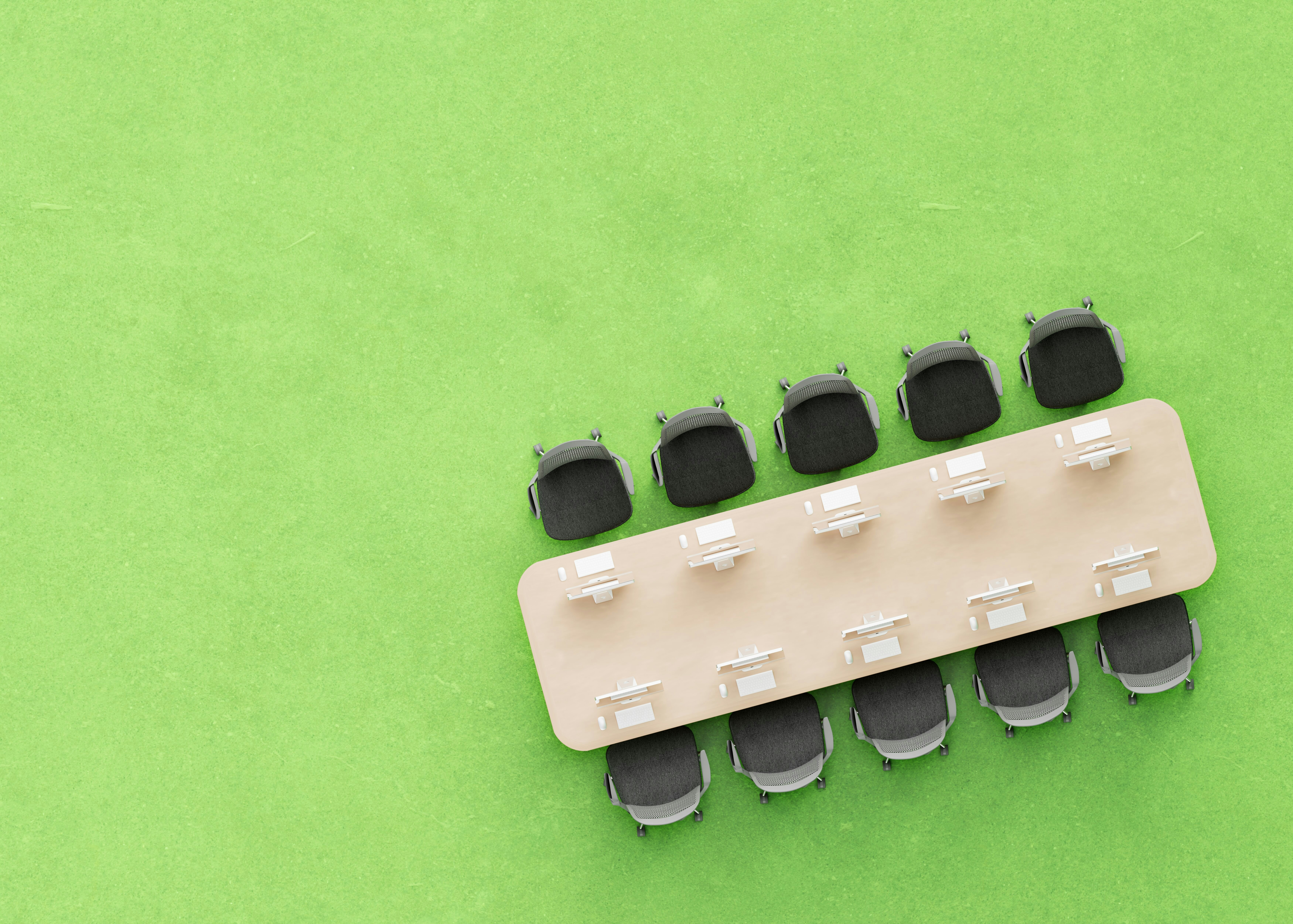 A close up of a guitar bridge on a green background