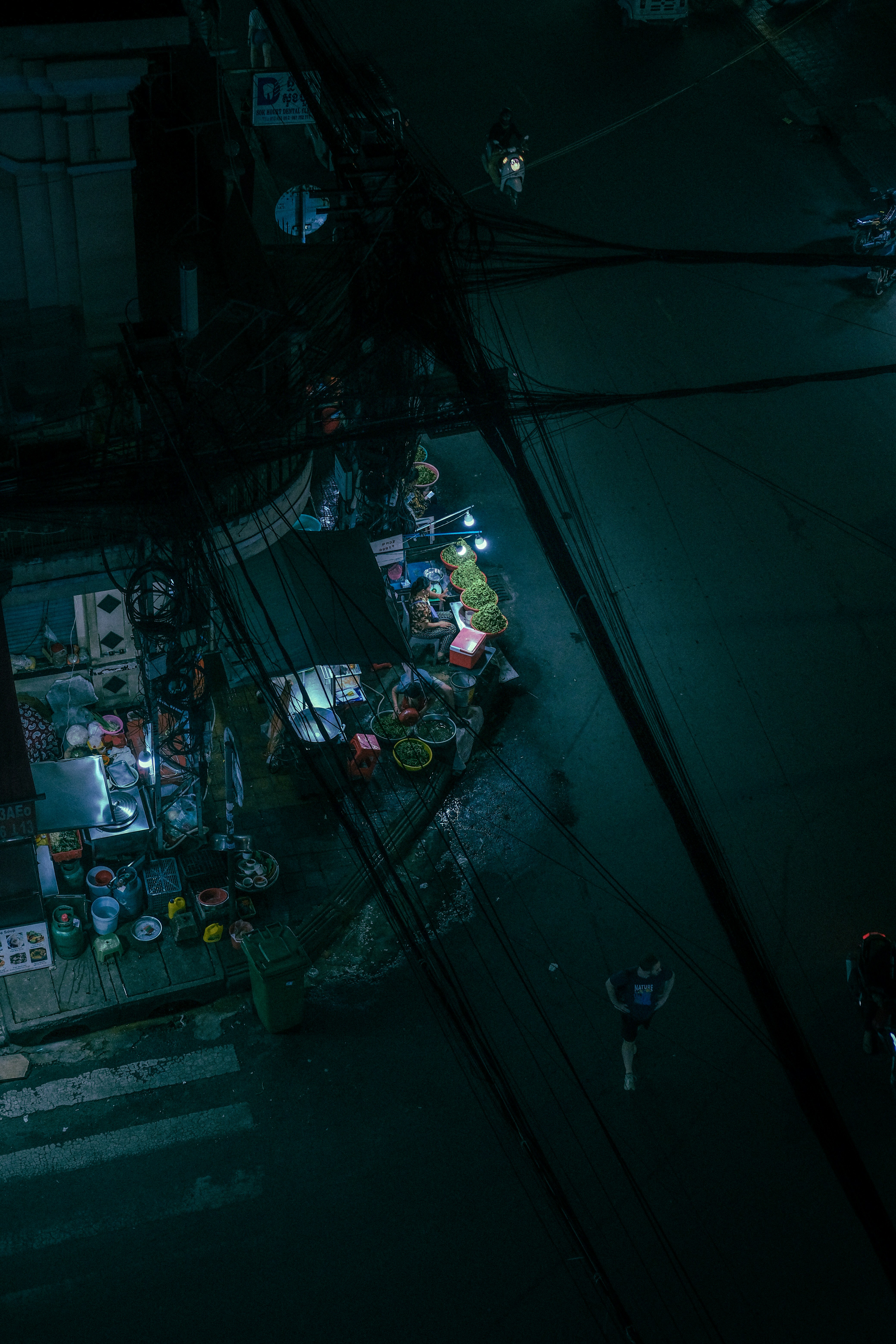 An overhead view of a city street at night