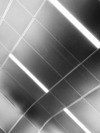 A black and white photo of a ceiling