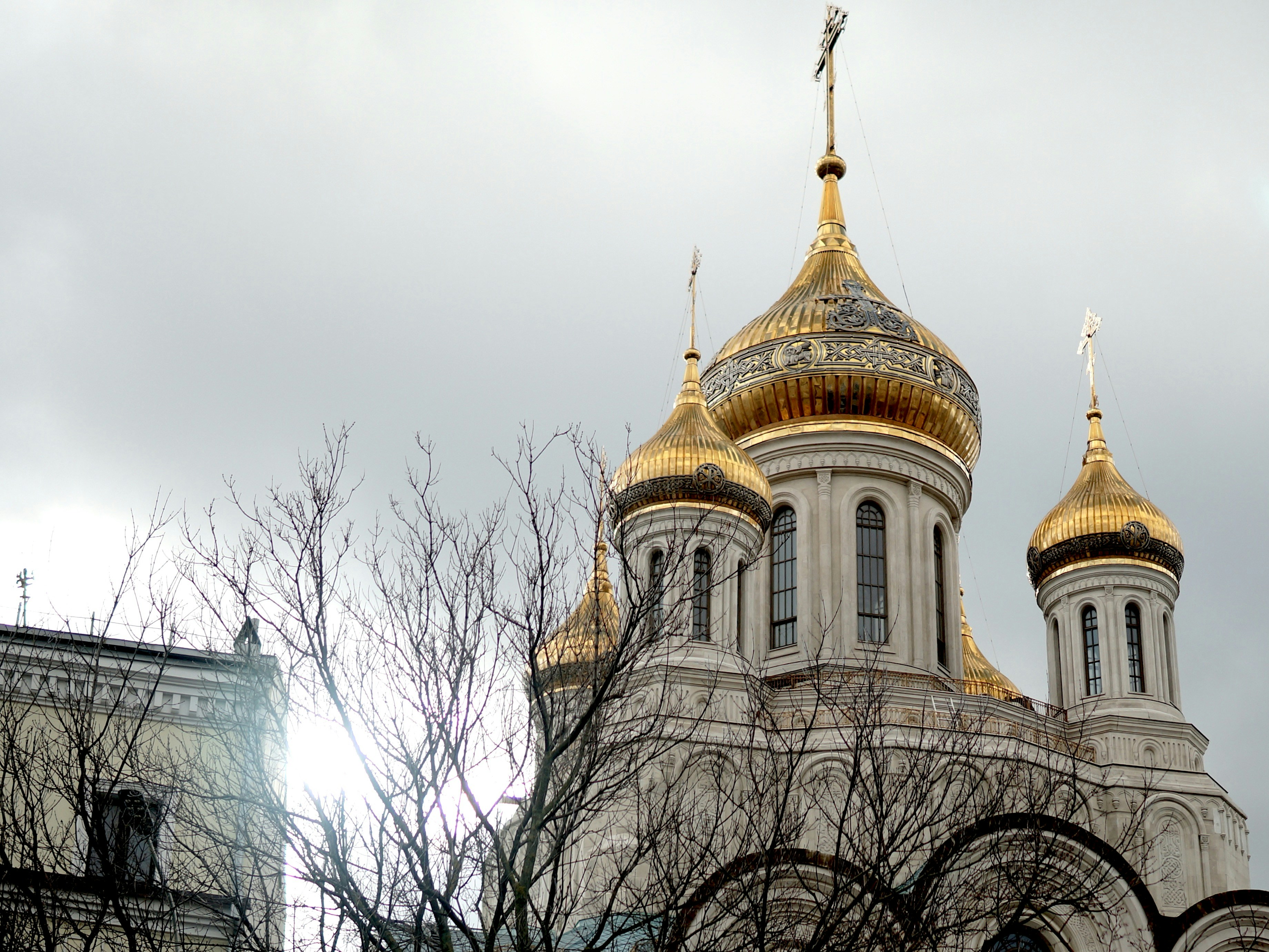 A church with a golden roof and two towers