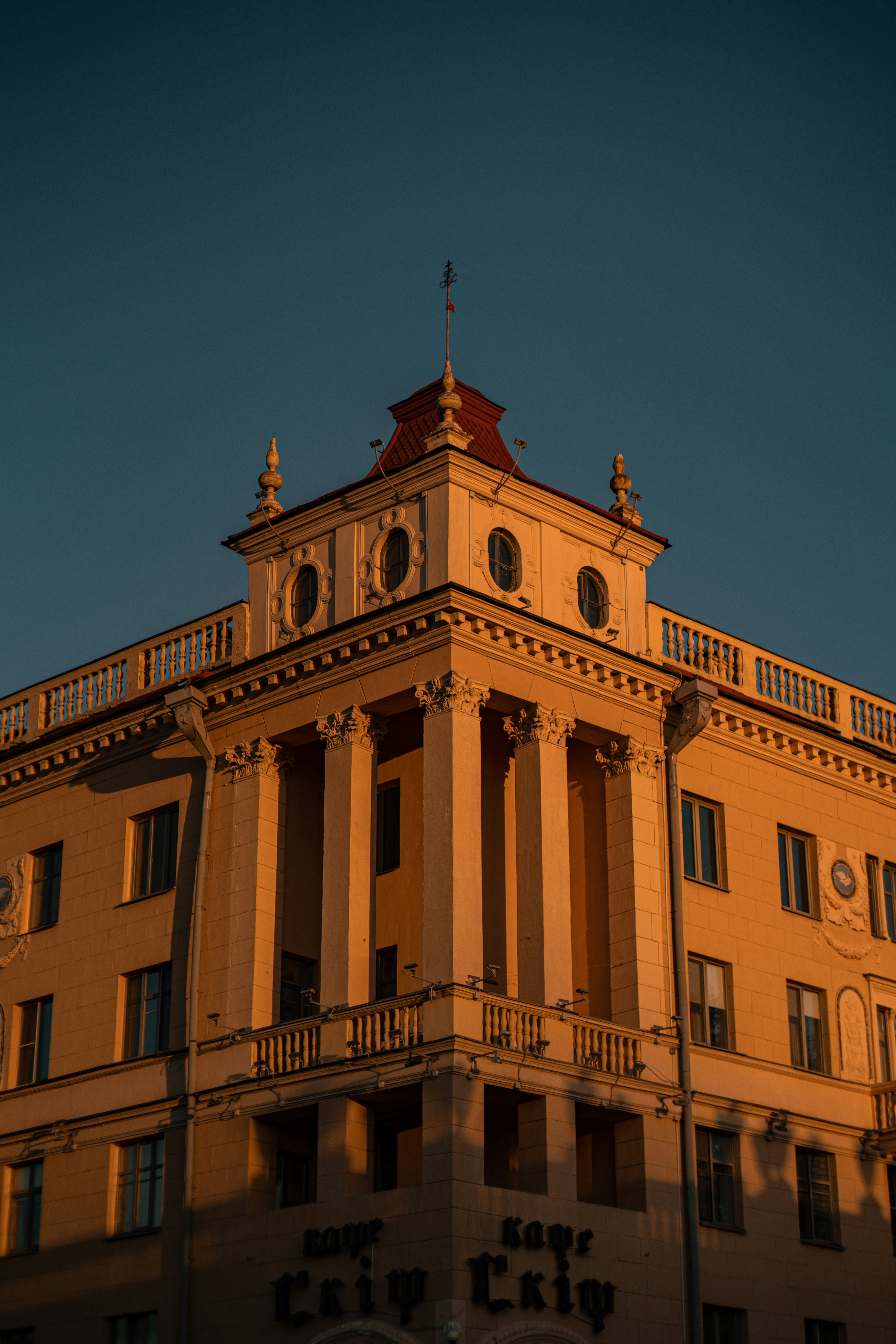 A tall building with a clock on the top of it