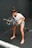 A man holding a barbell in a gym