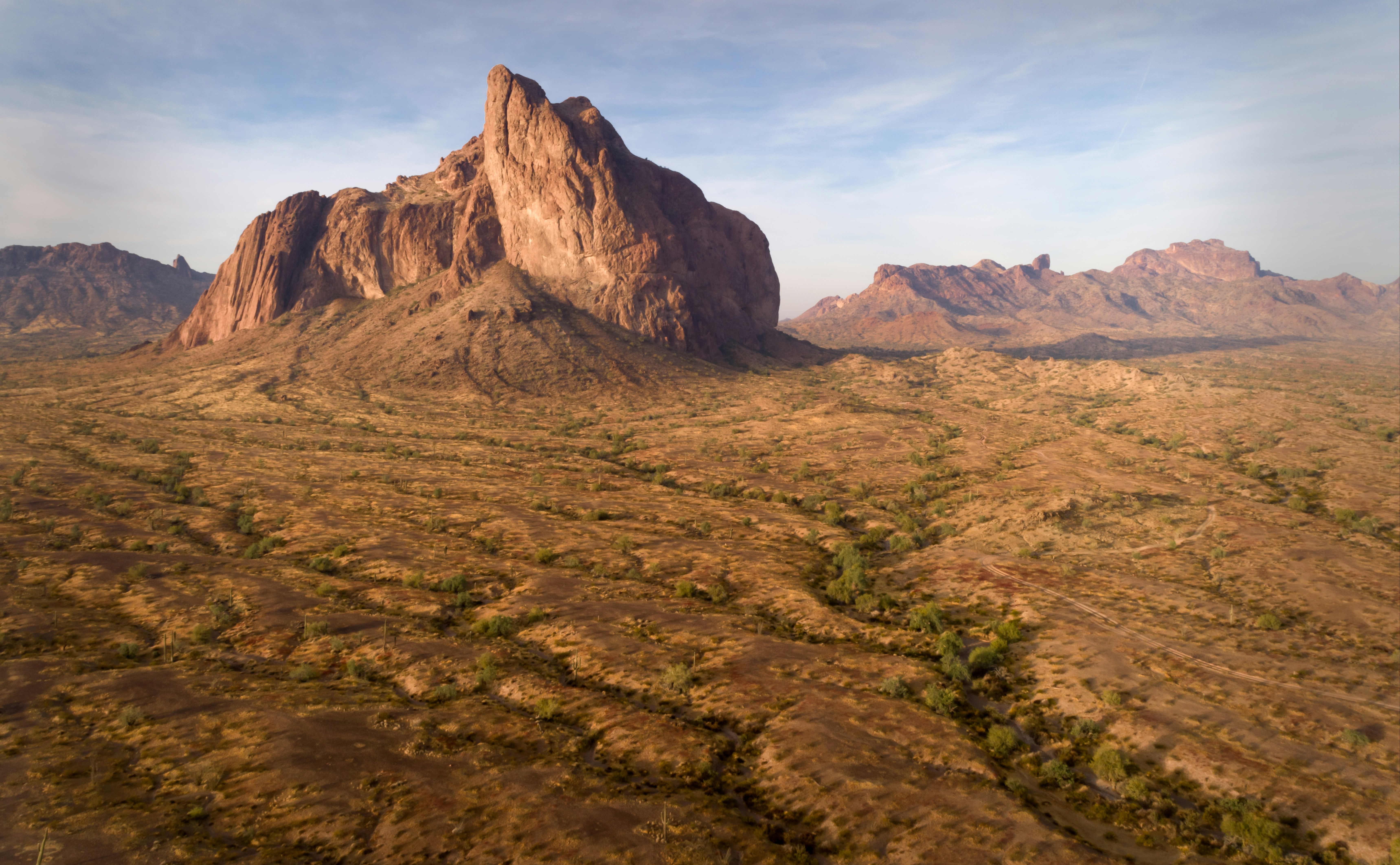An aerial view of a mountain range in the desert