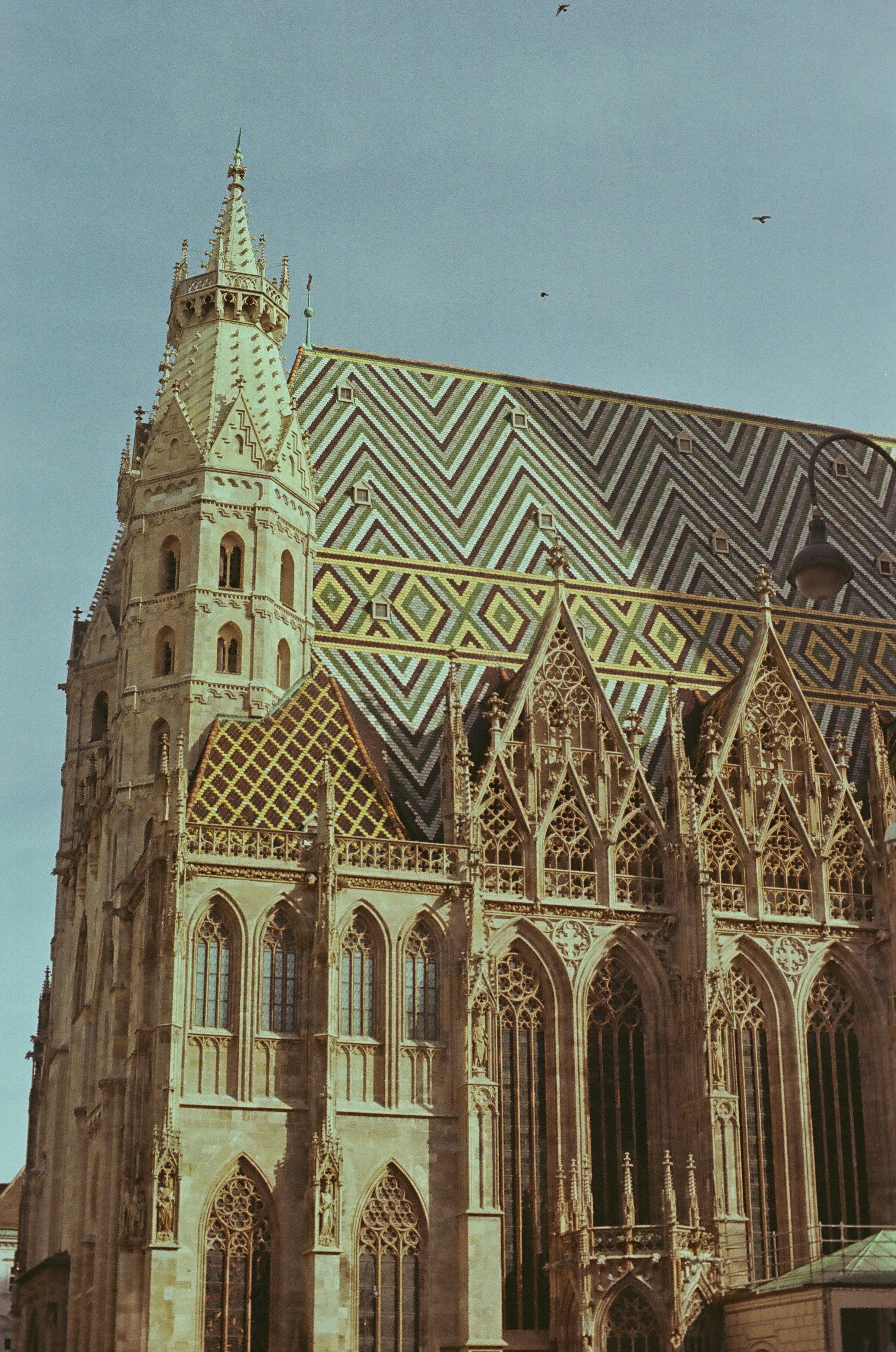 A large cathedral with a clock on the front of it
