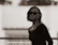 A woman wearing sunglasses and a black top