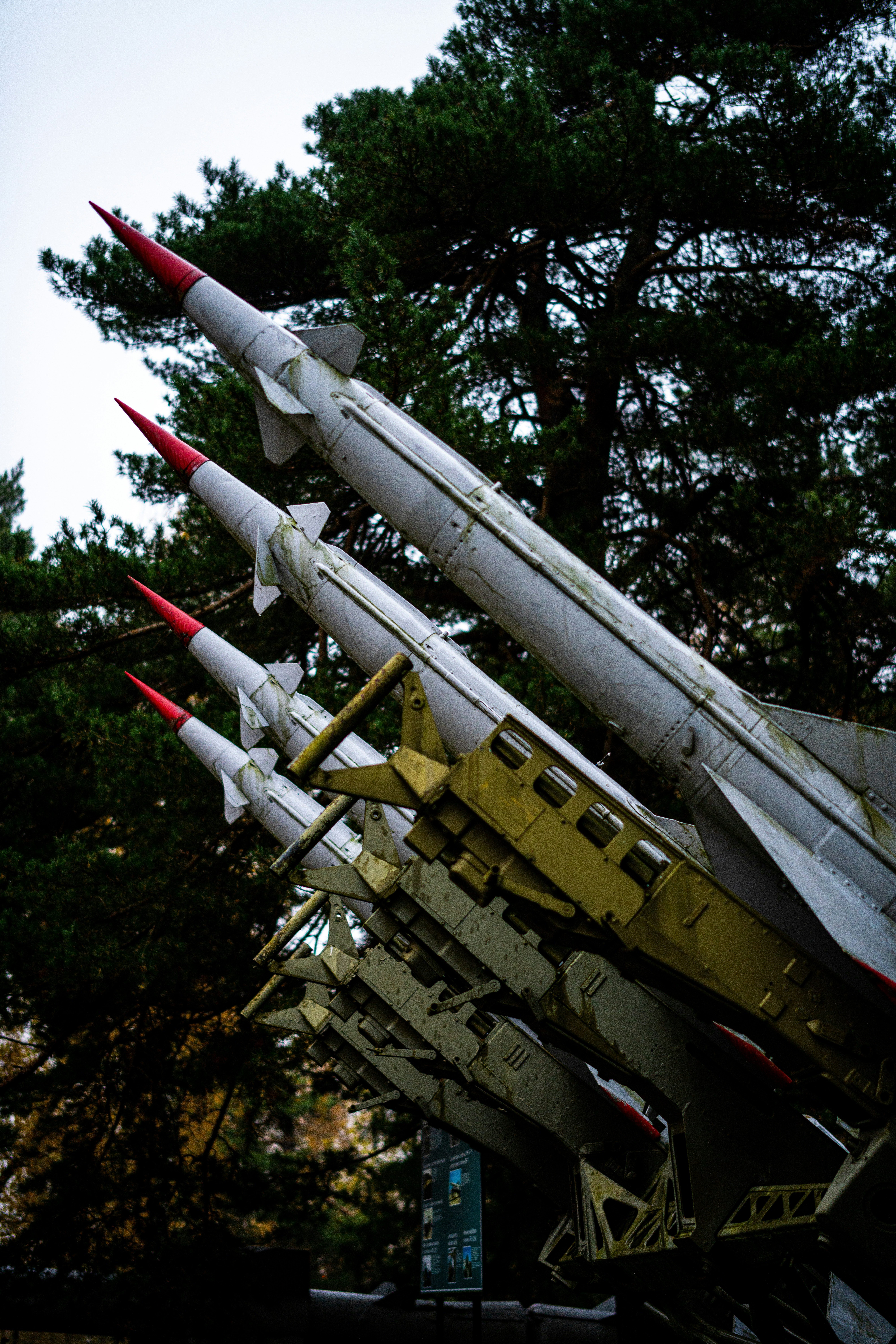 A group of missiles sitting on top of each other