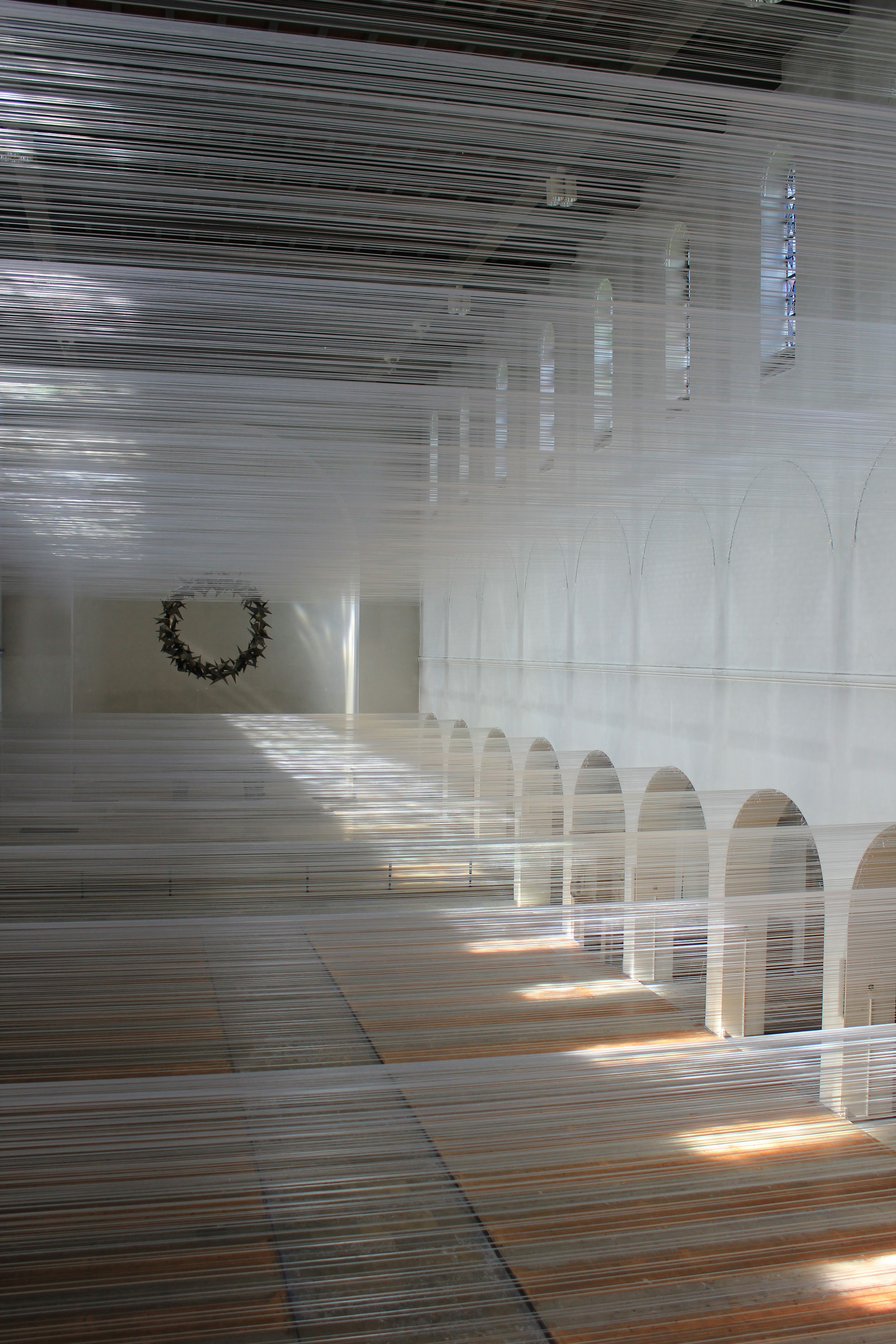 A room filled with lots of white chairs
