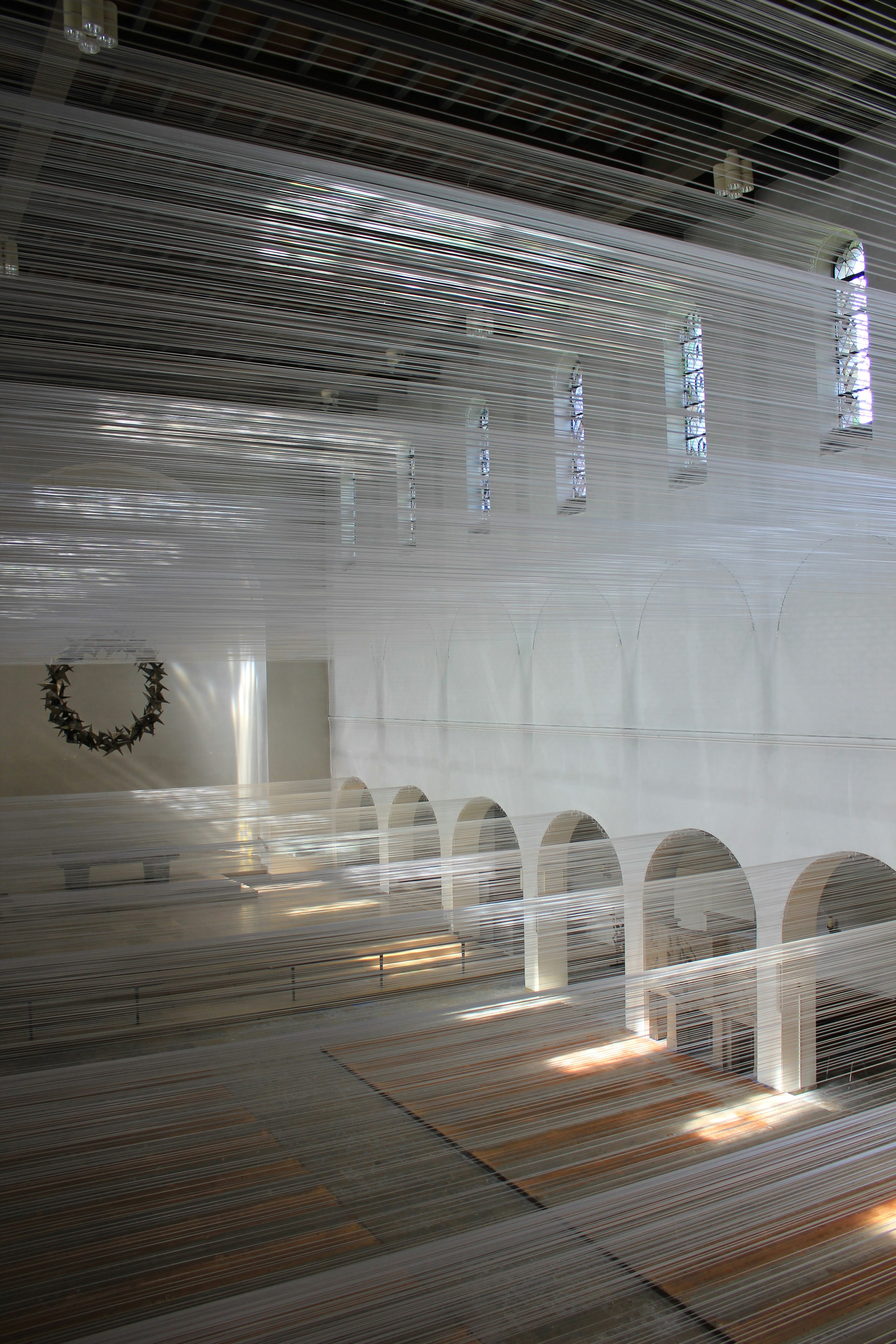 woman wearing yellow long-sleeved dress under white clouds and blue sky during daytime