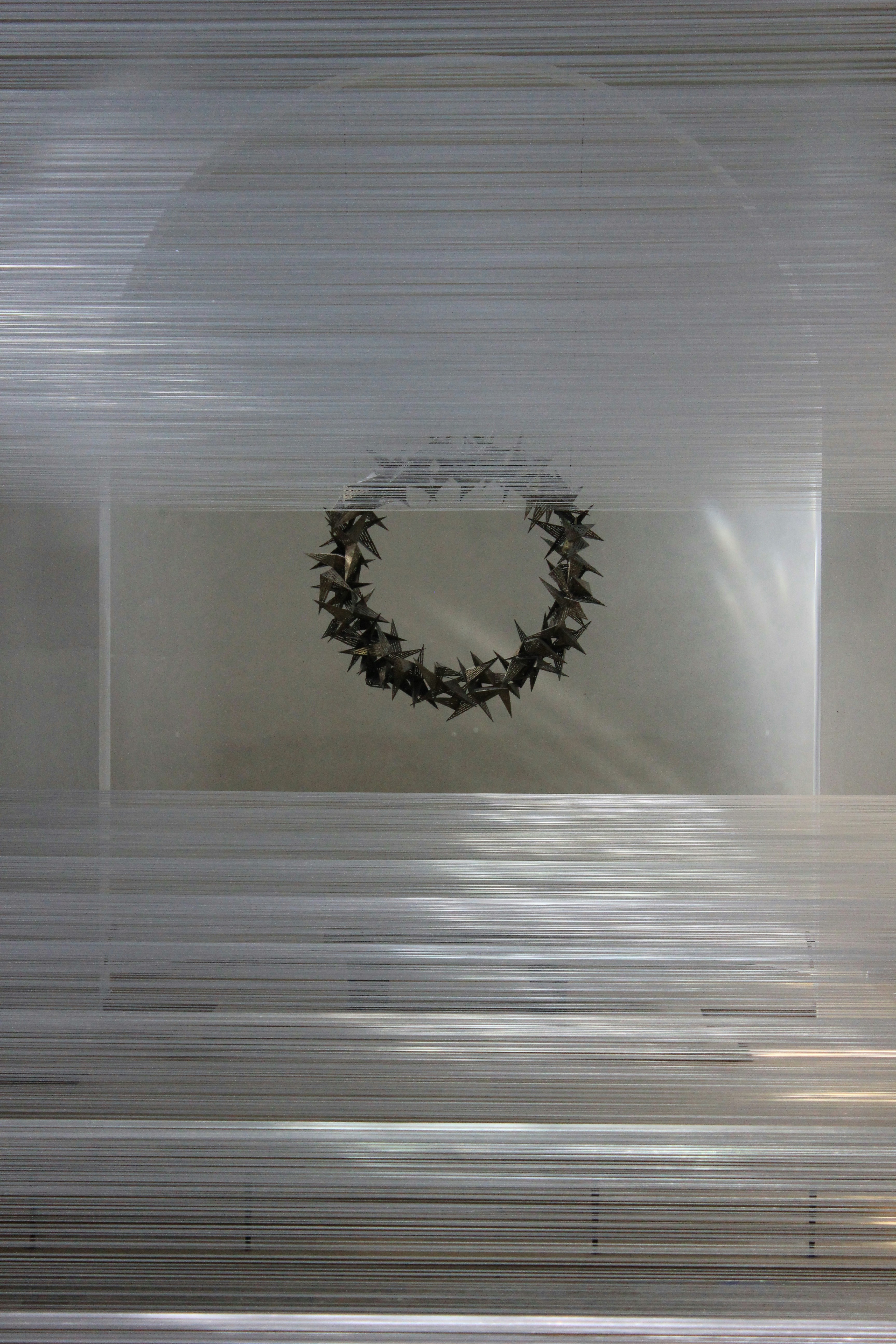 A picture of a wreath hanging on a wall
