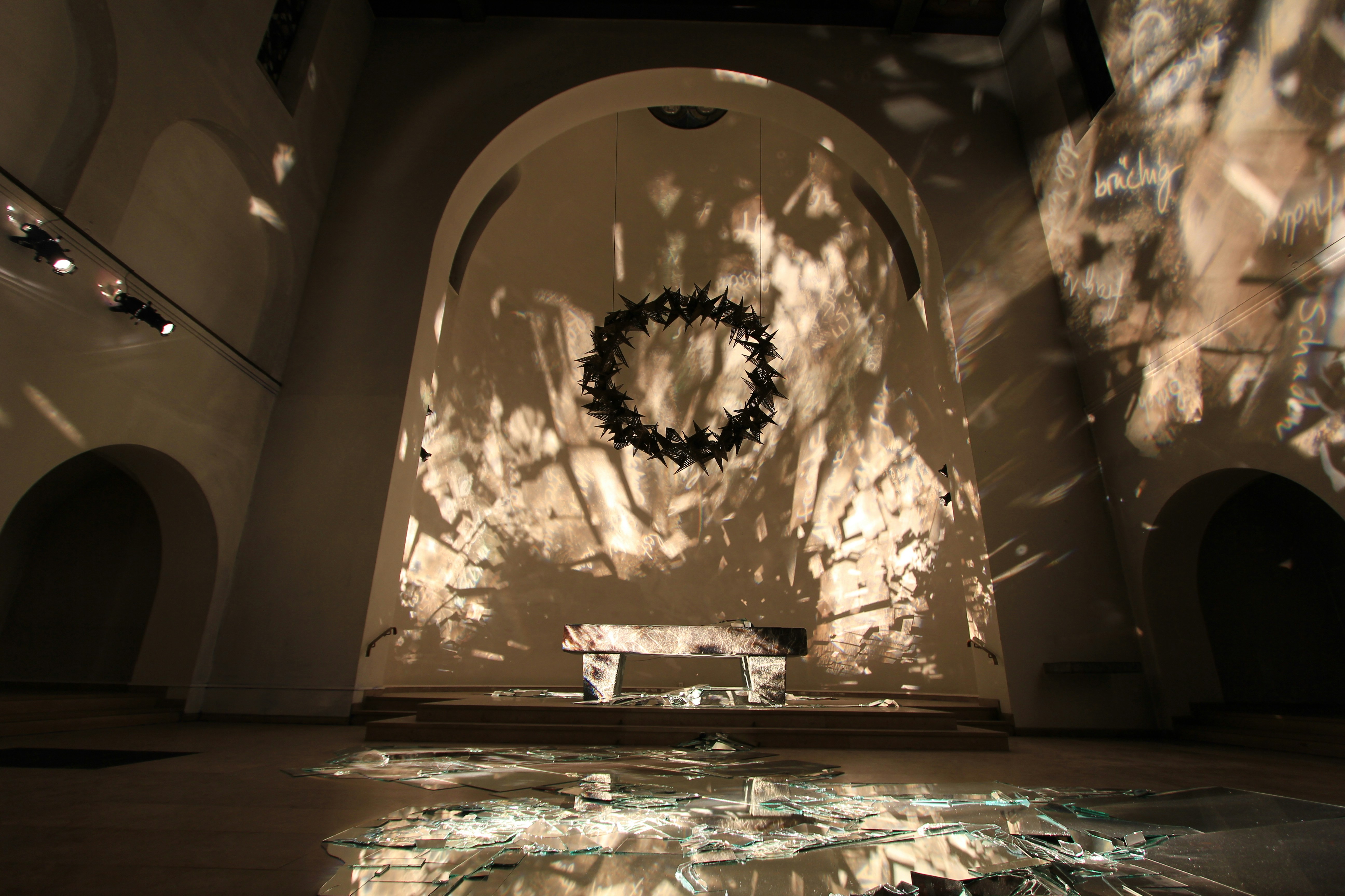 A room that has a lot of glass on the floor