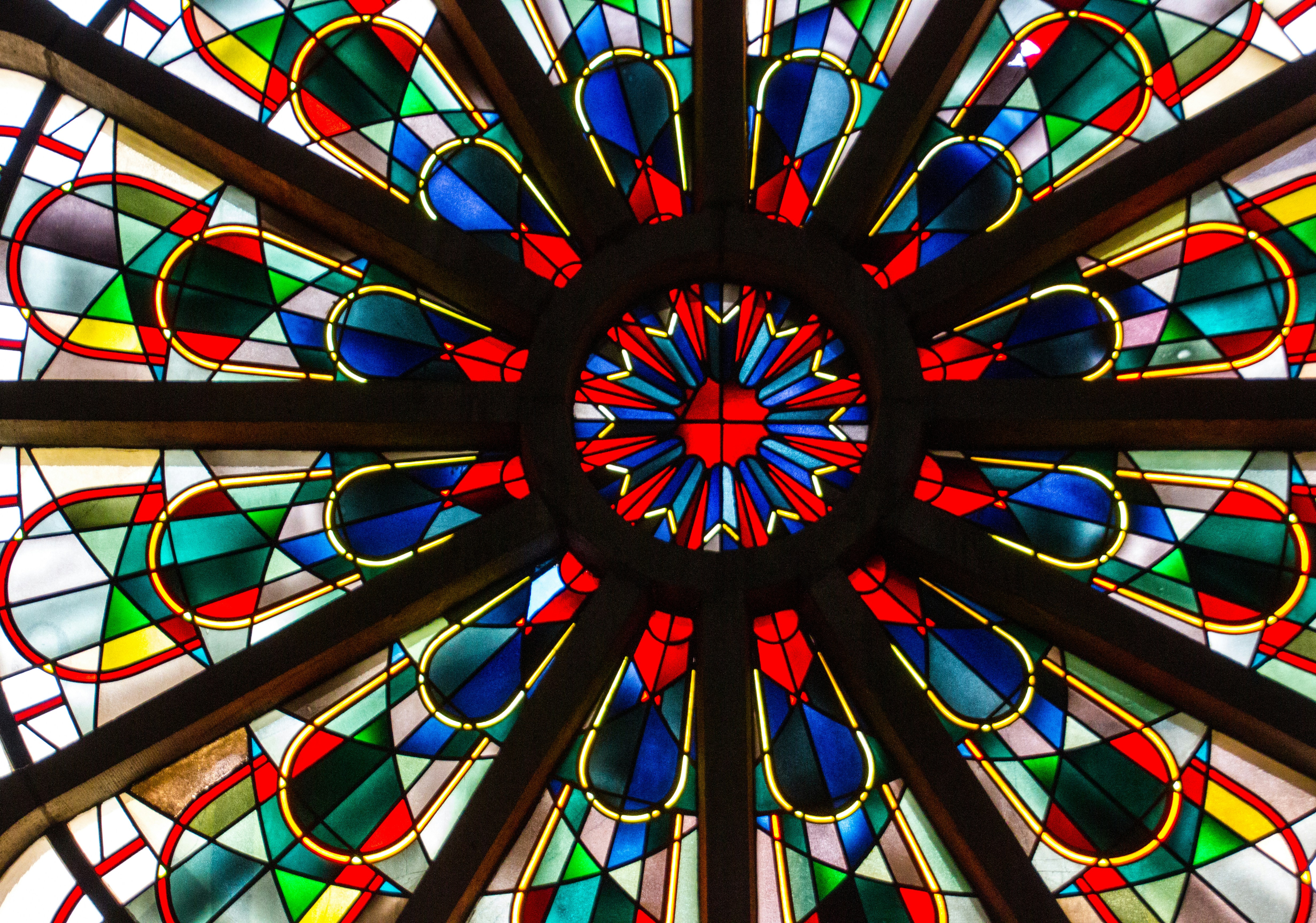 A colorful stained glass window in a building