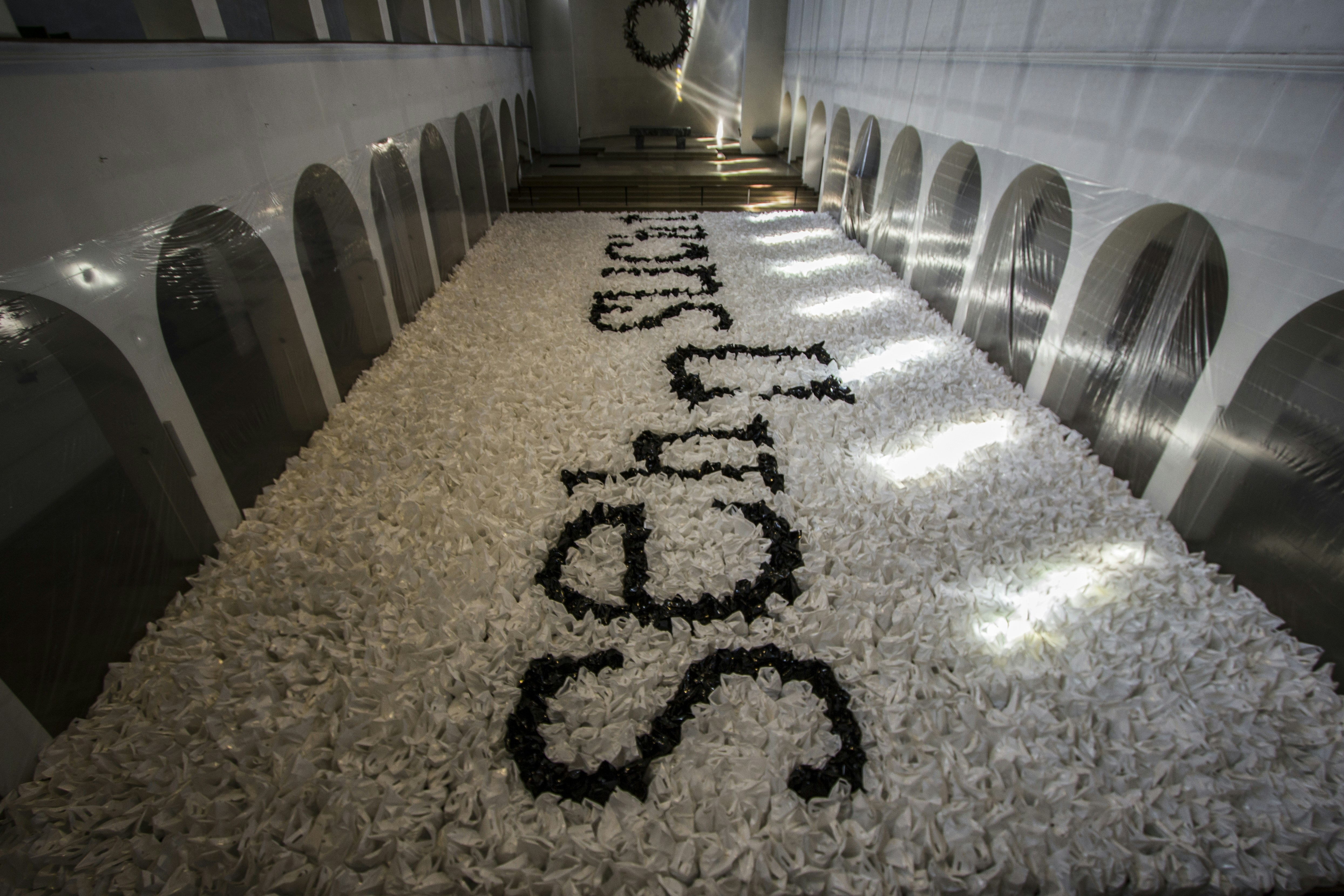 A row of urinals in a public restroom