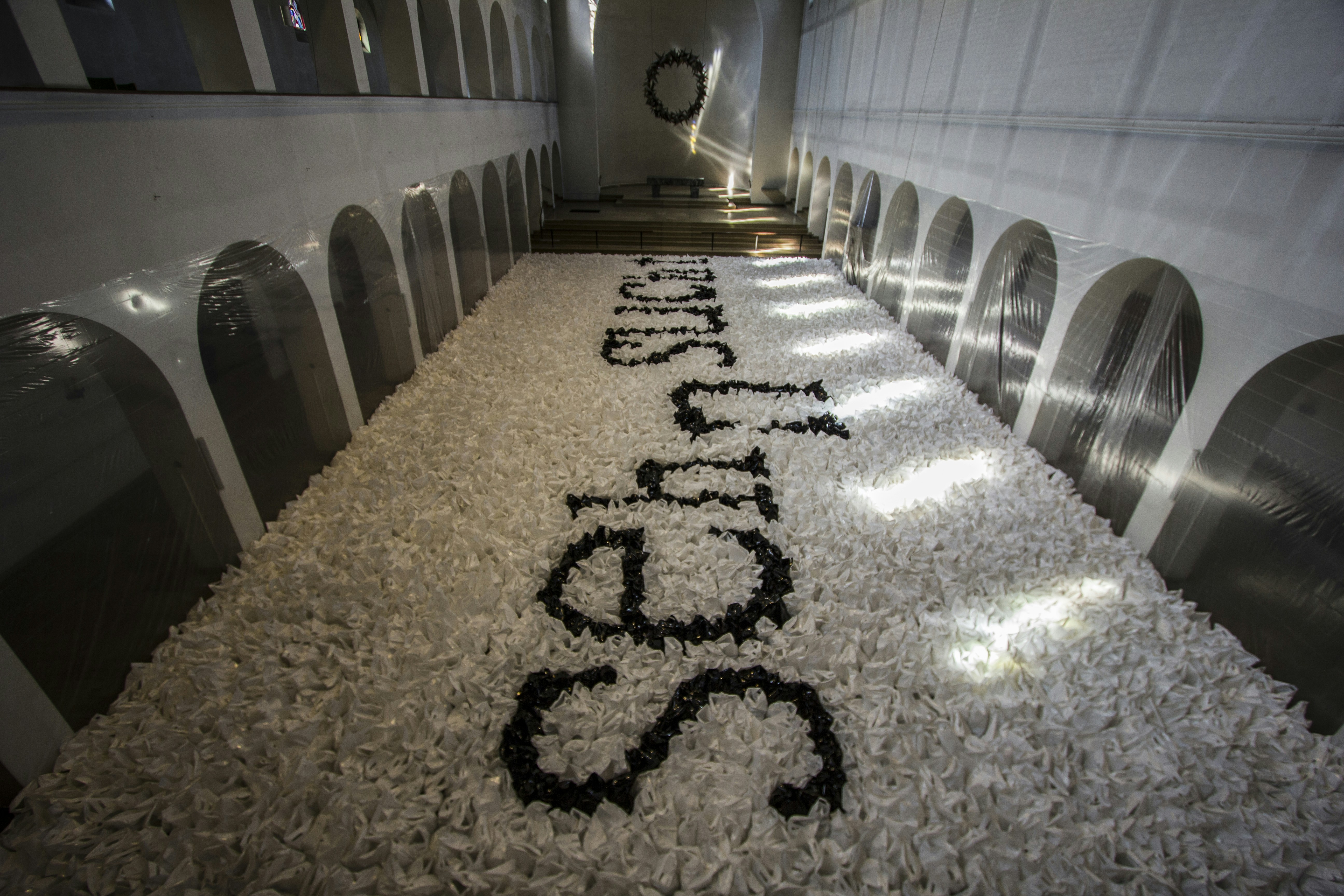 A row of urinals in a public restroom