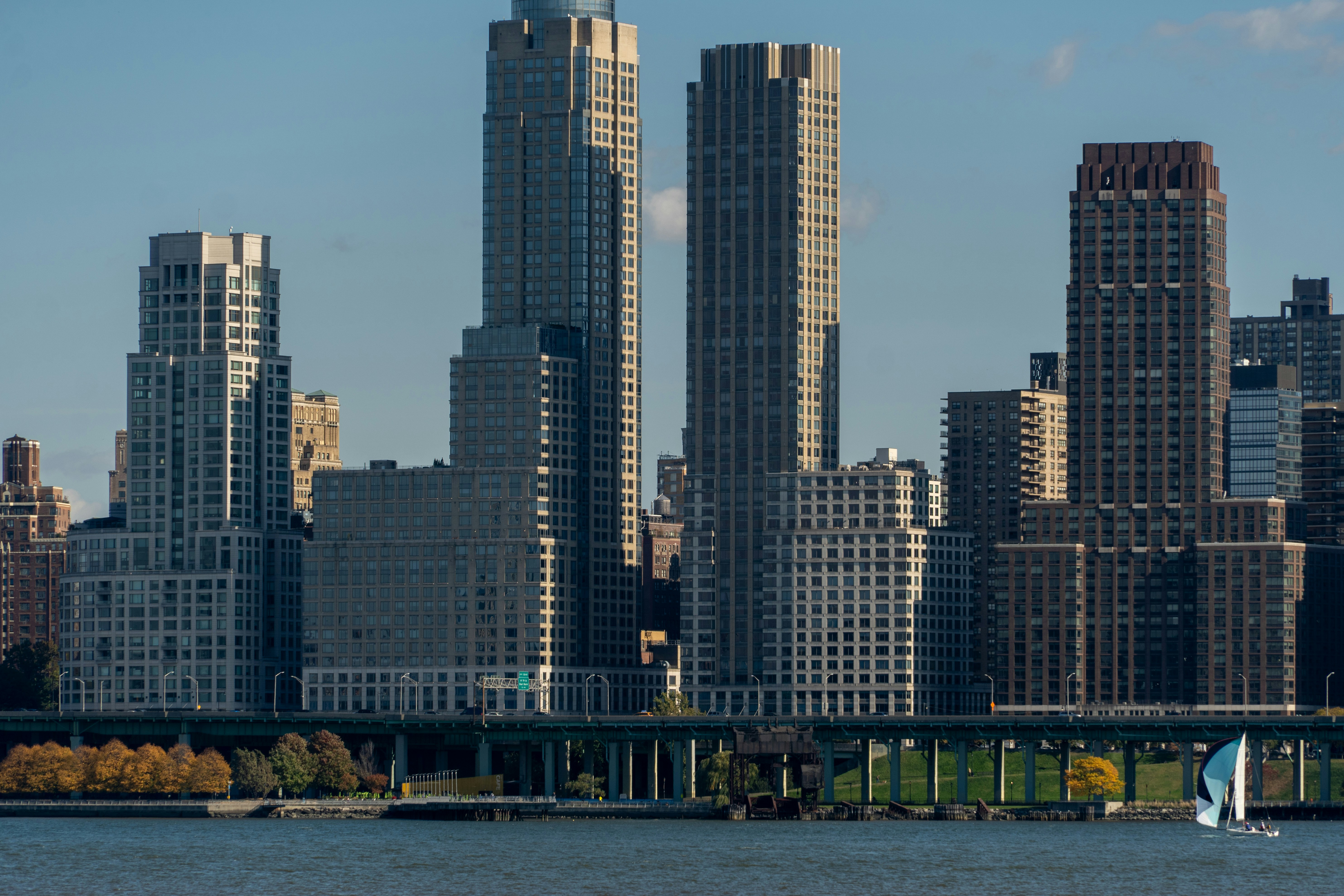 Chicago Riverwalk with skyscrapers in the background - luxury penthouses for rent in chicago